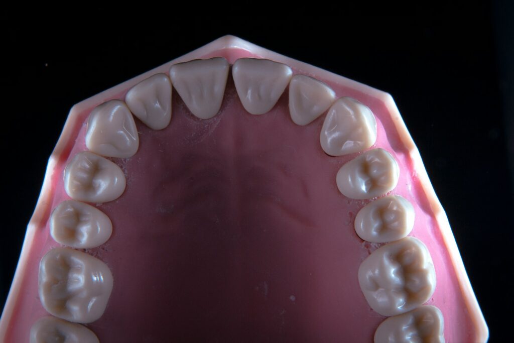 a close-up of a pink pill